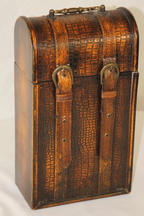 Furnishing – Tall wooden chest. Piece has one handle and two buckle clamps. Filled with feathers. Nice piece. Slight ware to straps