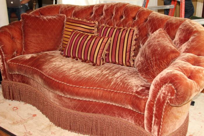 Furniture – Couch. Plush couch with fringed bottom. Piece has buttoned back and velvety material, in a quilted pattern. Throw pillows of various sizes included. In very nice condition.