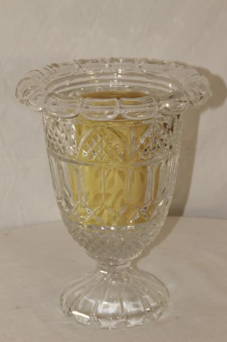 Furnishings – Clear glass piece. Cut glass symmetrical pattern. Piece can be used as candle holder or as vase. No chips, nicks, or scratches. In nice condition. Comes with pillar candle