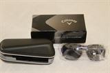Apparel & Accessories – Pair of Callaway sunglasses. Eyewear comes with case and original box. White plastic rims with dark shades.