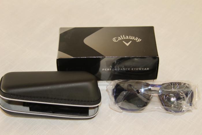 Apparel & Accessories – Pair of Callaway sunglasses. Eyewear comes with case and original box. White plastic rims with dark shades.