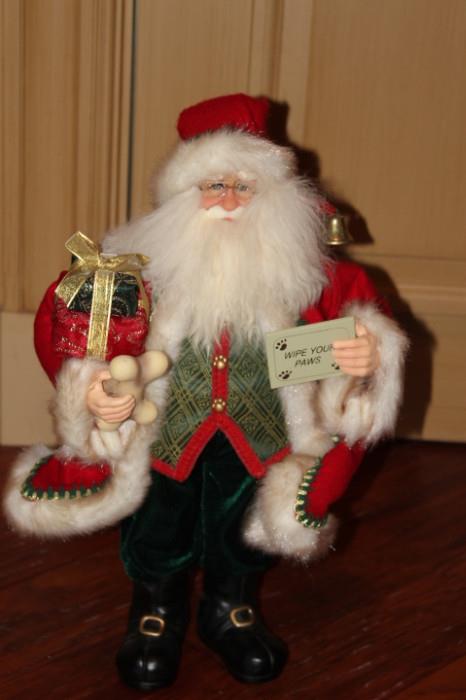 Collectibles – Santa figurine. Piece is beautifully crafted in traditional red, white and green garb. Lovely piece.