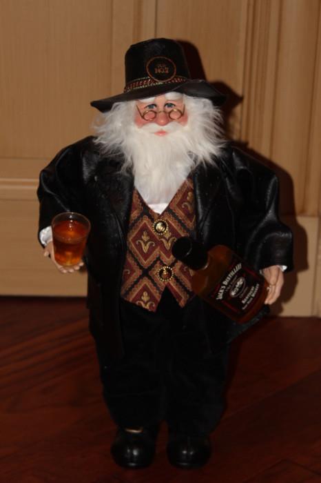 Collectibles – Santa figurine. Piece is beautifully crafted and dressed in black holding a Jack Daniel’s bottle. Lovely piece.