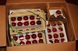 Miscellaneous – Box full of Christmas ornaments. Varied ornaments of colors, sizes, and decor are in original boxes
