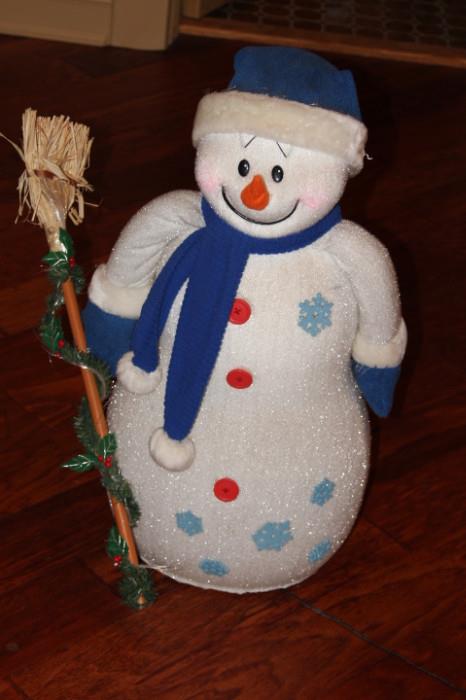 Miscellaneous – Plush decorative snowman. Piece is holding a broom