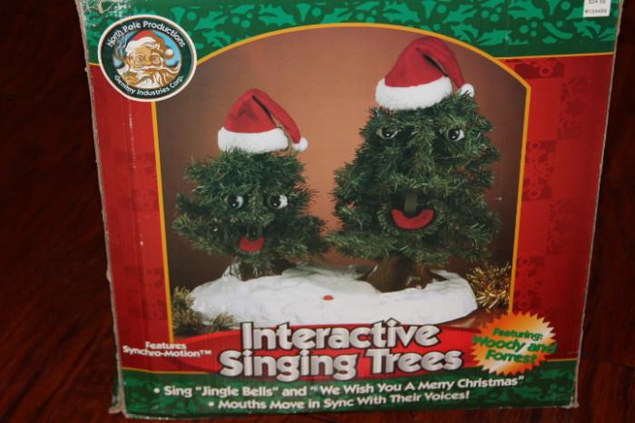 Miscellaneous – Pair of interactive singing trees. Pieces sing various Christmas songs. In original box.