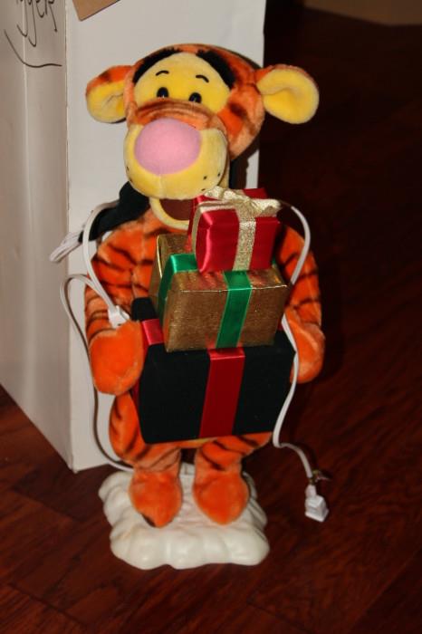 Miscellaneous – Tigger standing figurine. Piece is holding a stack of presents. Tigger has a cord and is light up. Nice piece.
