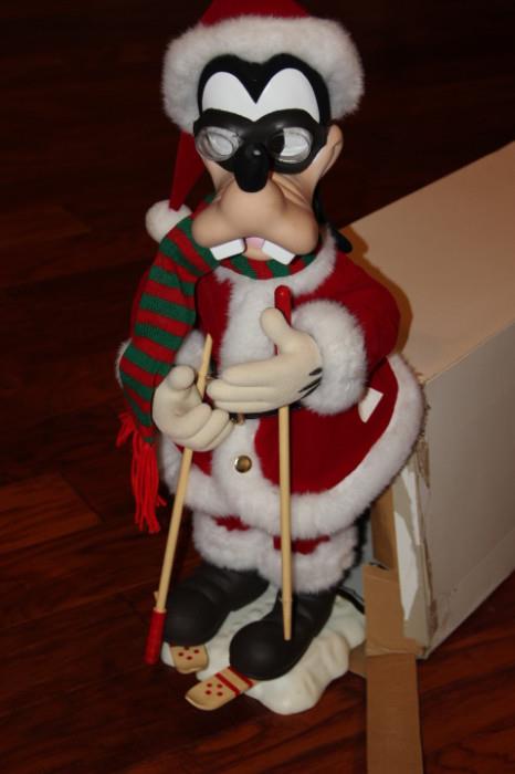 Miscellaneous – Goofy standing figurine. Piece is dressed in Christmas attire and is on skis.