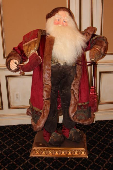 Collectibles – Large standing Santa figurine. Beautiful piece is dressed in Christmas garb. Sturdy nice piece