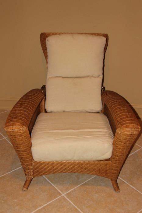 Furnishing – Wicker arm chair with cushioned back and seat. Piece reclines, is sturdy, and very comfortable. Marked ‘Lane Venture’. In very nice condition.
