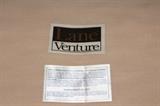 Furnishing – Wicker arm chair with cushioned back and seat. Piece reclines, is sturdy, and very comfortable. Marked ‘Lane Venture’. In very nice condition.