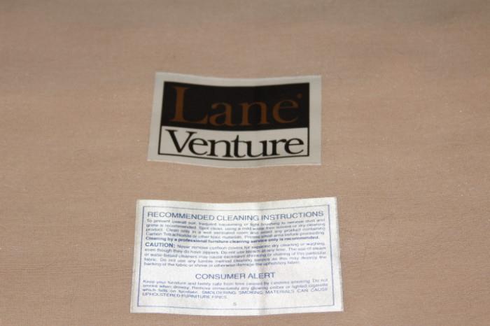 Furnishing – Wicker arm chair with cushioned back and seat. Piece reclines, is sturdy, and very comfortable. Marked ‘Lane Venture’. In very nice condition.