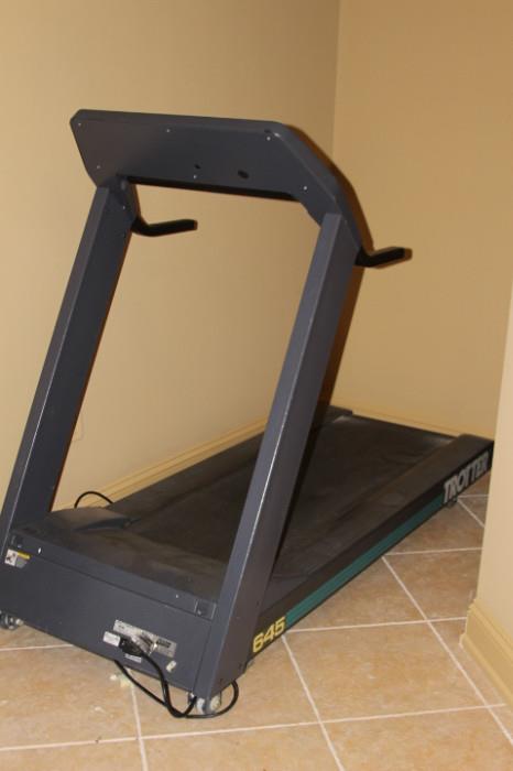 Toys & Hobbies – Treadmill. Piece is marked Trotter. For service and parts, contact information for Gym Source is attached. Piece has digital face. Has signs of ware but overall in good condition.