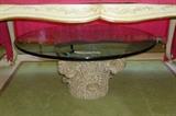 Column capital style base glass top coffee table