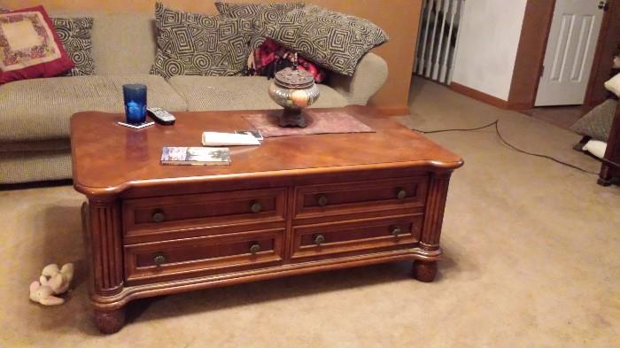 Nice wood coffee table and couch and matching love seat
