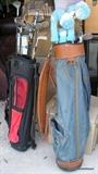 At least 6 golf bags with clubs including Ping, Copperheads and more