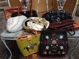 ALL TYPES OF PURSES AND PRICED TO SELL!