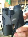 Several pairs of binoculars