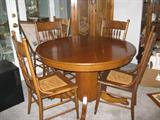 nice vintage oak round table w/five chairs, 2 extra chairs, All have pattern backs.