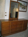 dresser w/mirror & has a matching nightstand