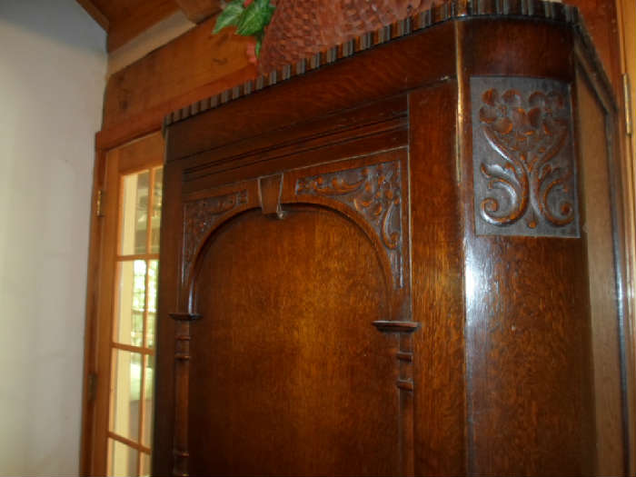 closeup of the top of the oak armoire