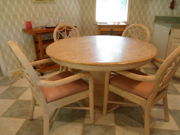 kitchen dining set w/4 chairs (has a little damage but would be good for rental or under a covered patio or arkansas room