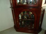closeup of lower section of curio ... dog collection