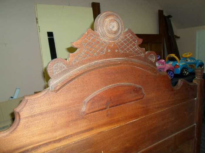 closeup of oak bed headboard