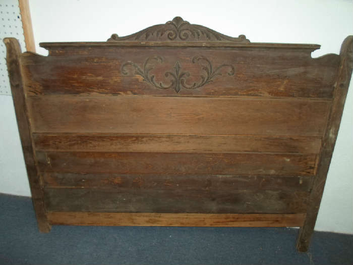 just the headboard.  Would be great just hung on the wall over a bed. Needs work