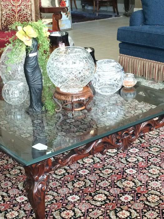 Glass top coffee table & some of the many rose bowls