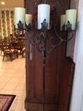                 Iron, floor-standing candelabra 