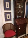 Barrel back caned chair with upholstered seat; lovely secretary; framed Asian prints