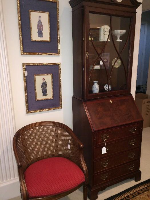 Barrel back caned chair with upholstered seat; lovely secretary; framed Asian prints