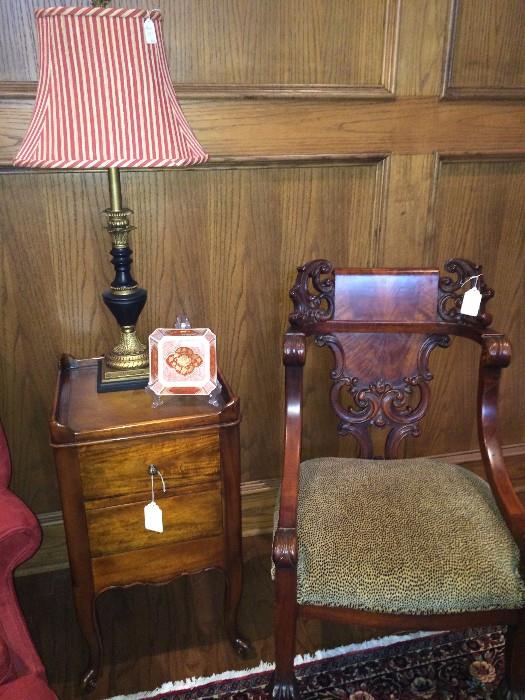Incredibly ornate chair with leopard fabric seat; small side table