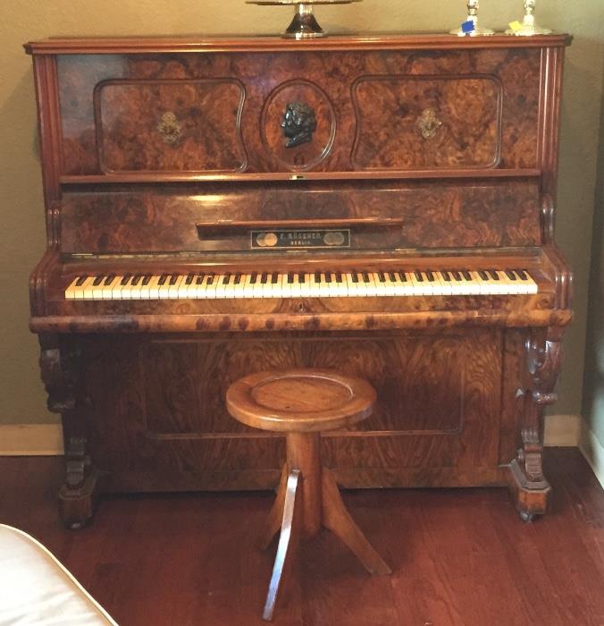 Awesome antique burled walnut piano with original stool from Berlin, Germany .