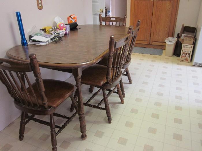 Kitchen dining set with six chairs and leaf (two chairs and leaf not pictured)