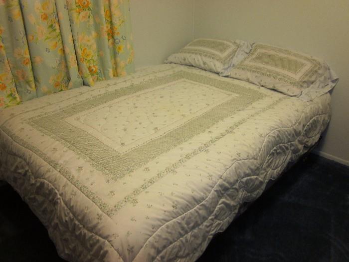 Double bed frame (mattress and bedding included).  Bedding can be sold separately