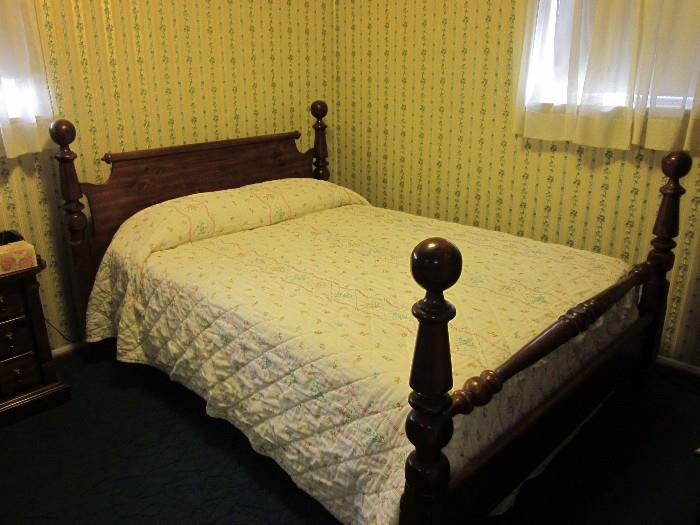 Double bed - colonial style head/foot board (mattress and bedding included).  Bedding can be sold separately.