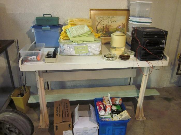 work bench, filing containers, scissors, stereo, ash trays, TONS of light bulbs, fishing stuff