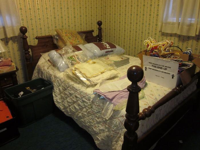 Bed (mattress, bedding included), pillows, vintage tablecloths, vintage aprons, hangers, vintage doilies
