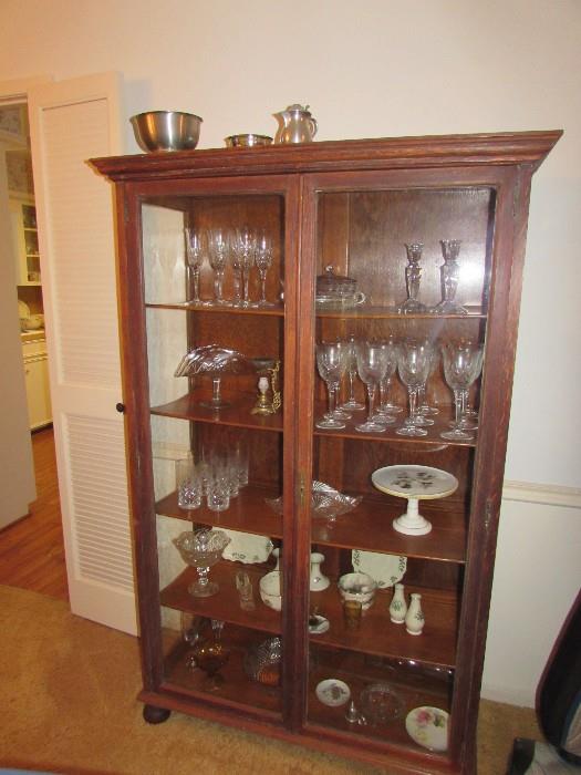 This is a beautiful antique curio that shows everything so well. 