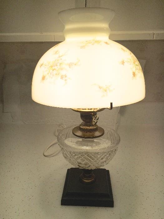 One of numerous delicate lamps with antique shades