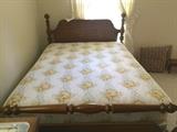 One of three lovely wooden beds with like-new mattress sets--this is the Sumtner Cabinet Co. bed