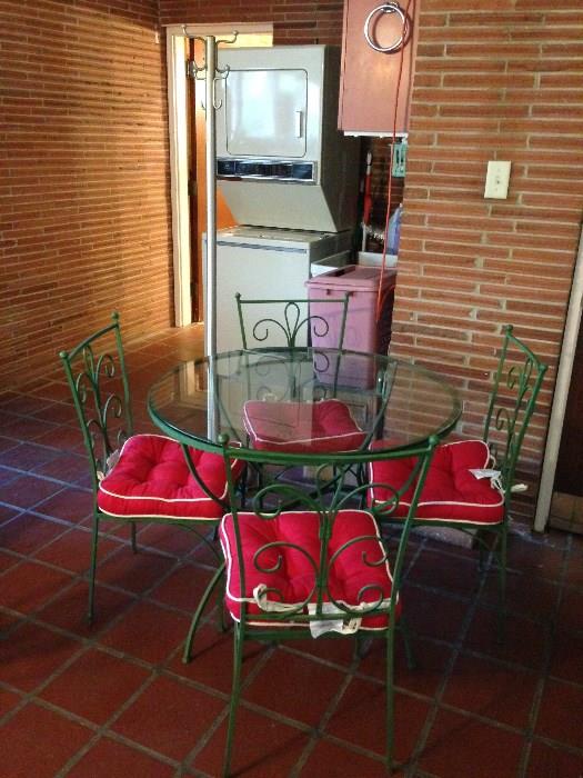 Patio table with glass top and 4 chairs