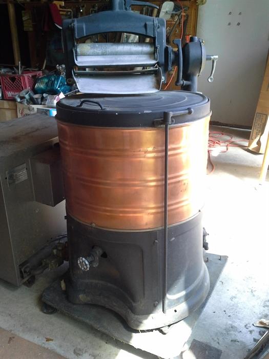 Fantastic Copper Washing Machine...plus we have a cute vintage table top washer and 2 wooden racks for laundry wash tubs with wringers.