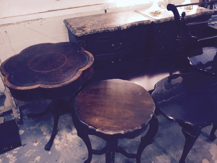 vintage tables, left one is a leather top about 10 to 12 more throughout the house