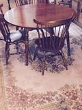 Dining room table in perfect condition shown without the 2 leafs in it comes with 6 matching chairs