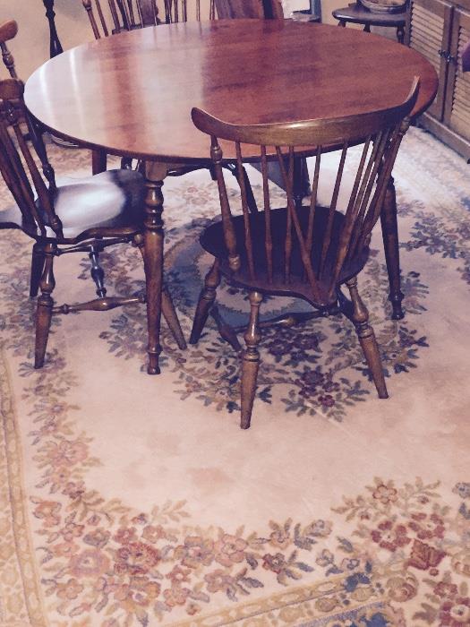 Dining room table in perfect condition shown without the 2 leafs in it comes with 6 matching chairs