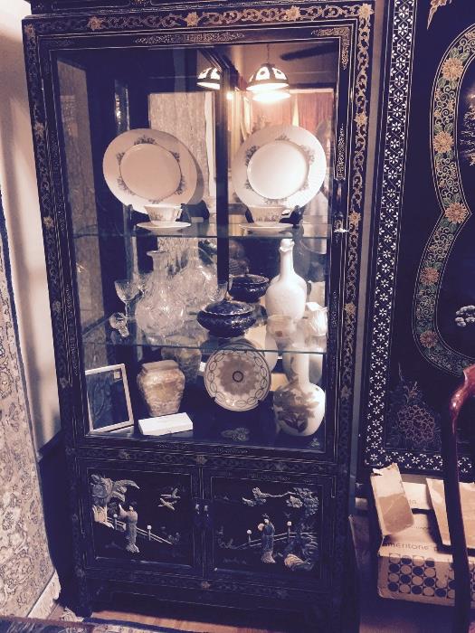 Oriental inlaid display cabinet with china