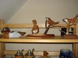 Some of the carved birds....sale includes several Roy White carvings